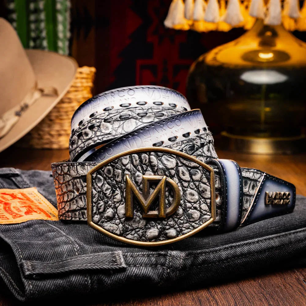 Model wearing gray Montana belt with jeans, showcasing western style leather and brass buckle.