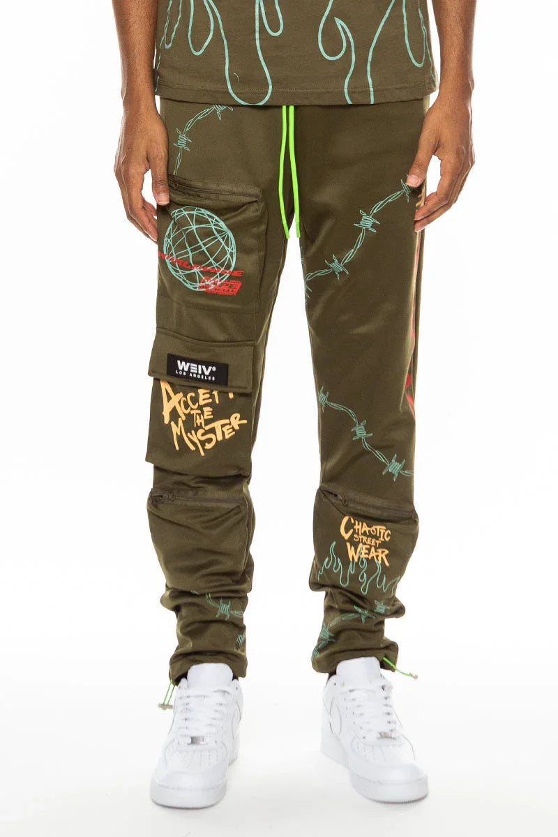 Olive green men's track pants displayed flat, featuring pouch pockets with zippers