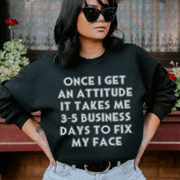 Black sweatshirt featuring white 'Once I Get An Attitude' text centered on chest.