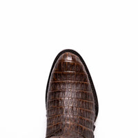 Close view of the vamp featuring genuine caiman belly skin on Phoenix Aged Brown boot.