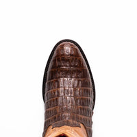 Top view focusing on round toe and textured caiman skin vamp of cowboy boot.