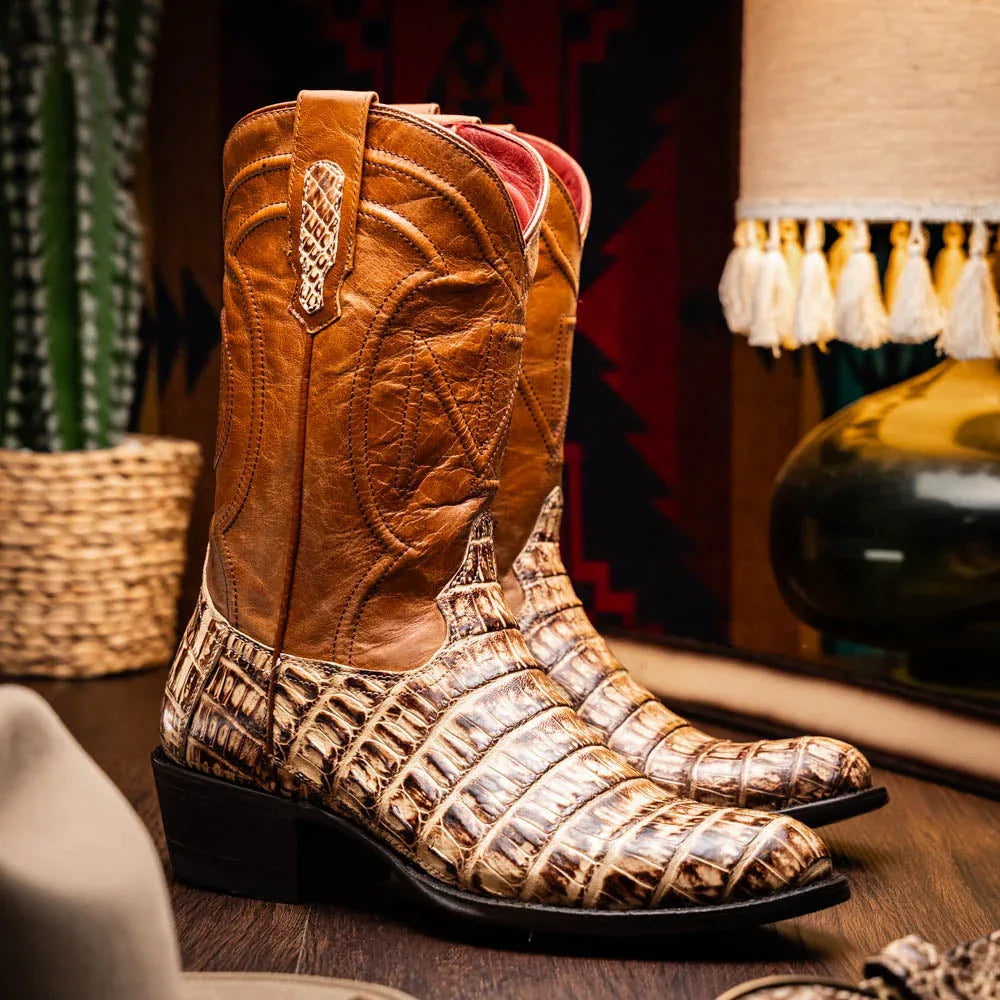 Lifestyle image of person wearing Phoenix Stone Orix cowboy boots outdoors