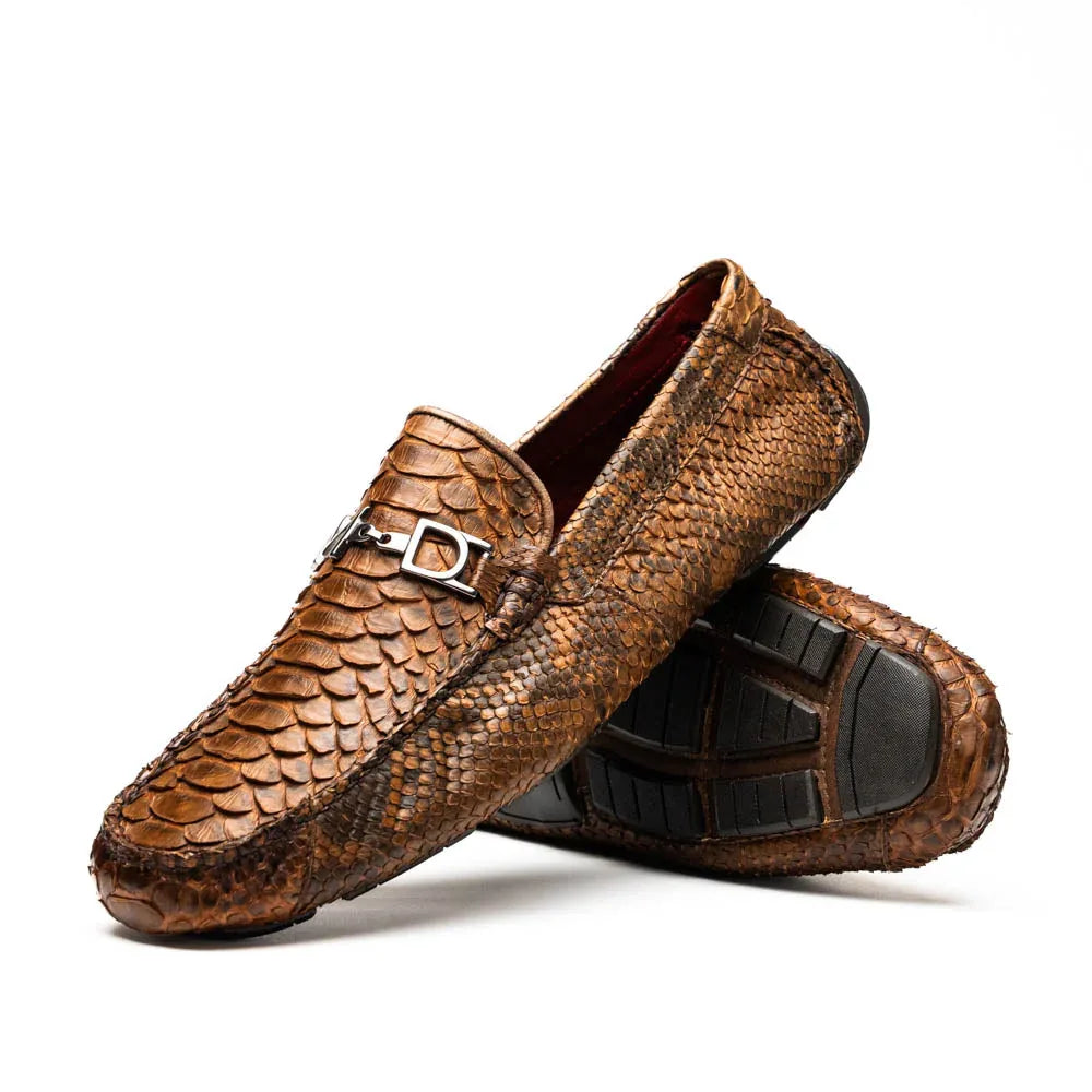 Close-up of Pia Cognac python leather driver shoe showing rich texture and stitching detail.