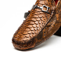 Top view of Pia Cognac python leather driver shoe emphasizing soft, smooth finish.