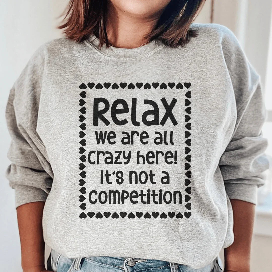 Sport grey sweatshirt with 'Relax We Are All Crazy Here' text in white script on chest.