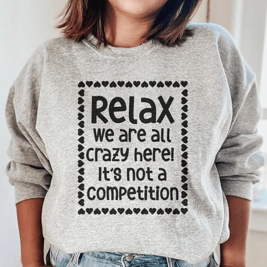 Sport grey sweatshirt with 'Relax We Are All Crazy Here' text in white script on chest.
