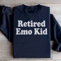 Black fleece sweatshirt shown from front with 'Retired Emo Kid' graphic, soft and warm.