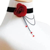 Close-up of black lace necklace showing detailed scalloped edges and mesh design.