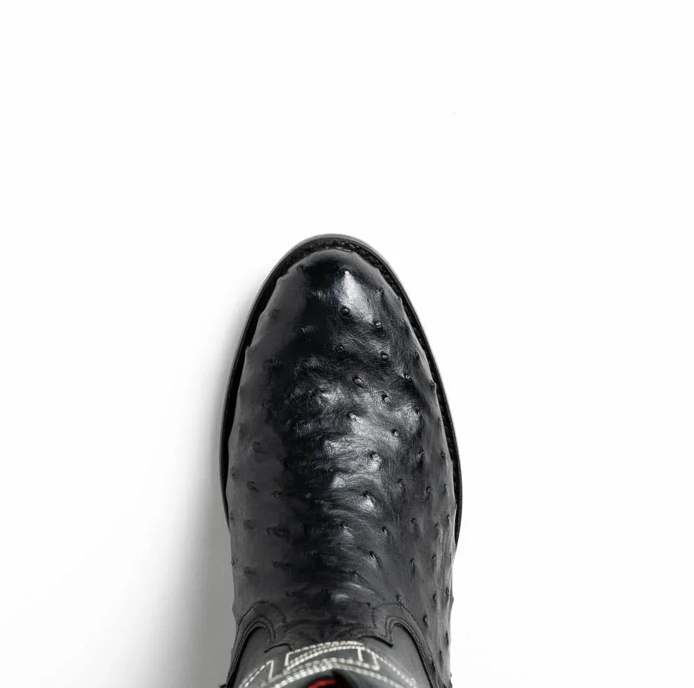Savannah cowboy boot standing upright, showcasing red vamp and signature red stitching.