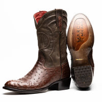 Close-up of brown Savannah Kango Tabac cowboy boot crafted with genuine ostrich skin and red leather accents.