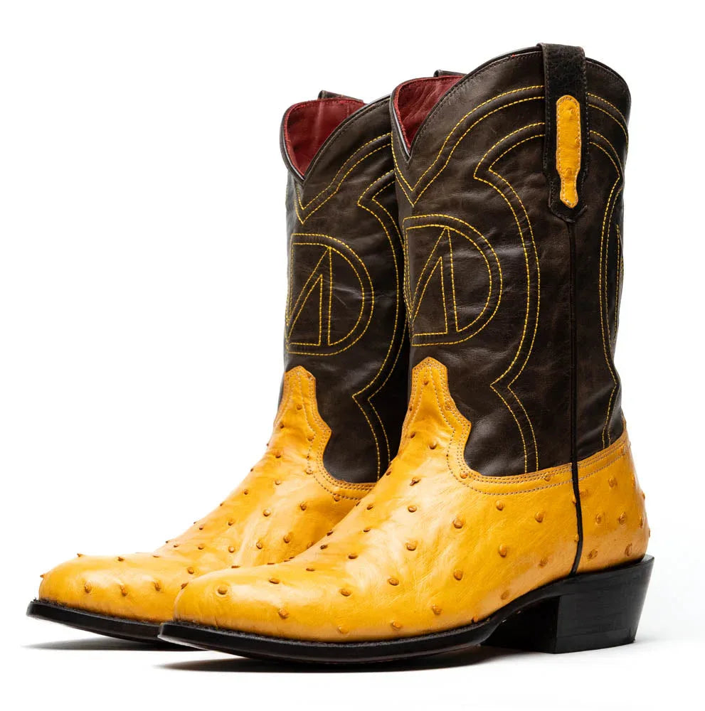 Front view of Savannah Buttercup ostrich leather cowboy boot with red accent and round toe.