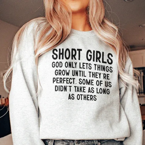 Sport grey sweatshirt with white text reading 'Short Girls God Only Lets Things Grow Until They're Perfect'