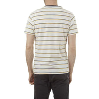 Model wearing Edgar Striped Tee paired with casual pants, highlighting the overall look.