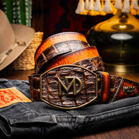 Lifestyle image showing the Texas Belt worn with denim jeans outdoors in natural light.