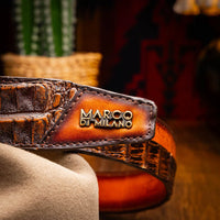 Close view of Texas Belt styled with casual outfit, emphasizing the texture and buckle details.