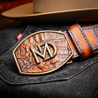 Outdoor view of Texas caiman crocodile Western belt worn with casual jeans and tucked shirt.