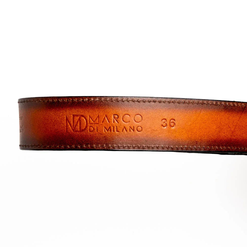 Vintage-style Western buckle and matching metal tip on Texas caiman crocodile and calfskin belt.