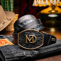 Model wearing Texas Belt with dark jeans, showcasing the belt’s western buckle and leather texture