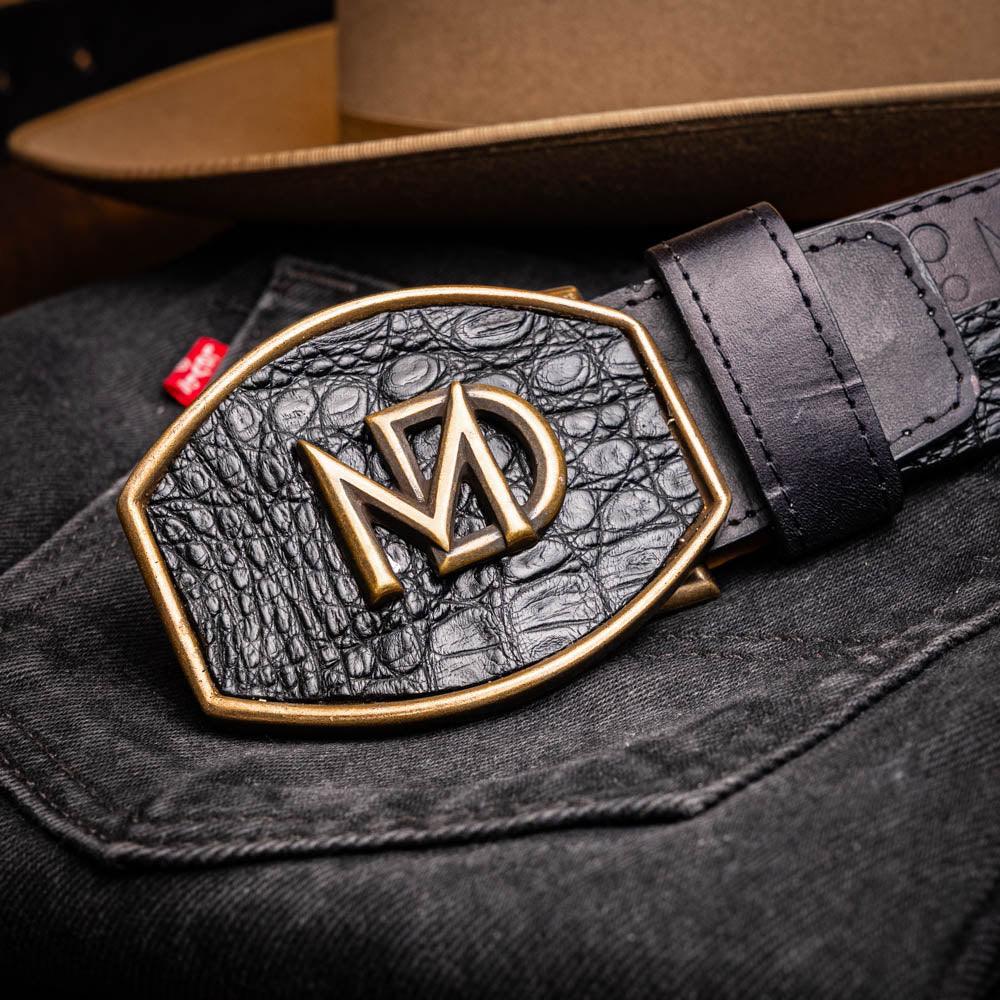 Close-up lifestyle shot featuring Texas Belt on model with rustic background