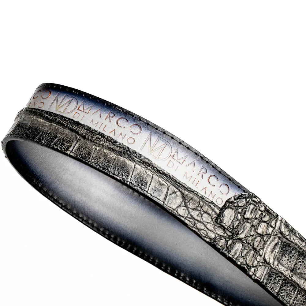 Close-up of gray leather belt tip matching the antique metal buckle design.