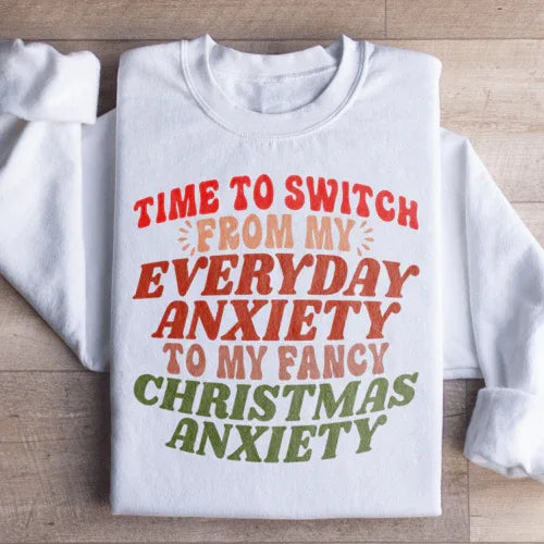 White sweatshirt with black text featuring the phrase 'Time To Switch From My Everyday Anxiety To My Fancy'.