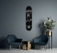 King Travis Skateboard with green-themed graphic artwork on the deck.