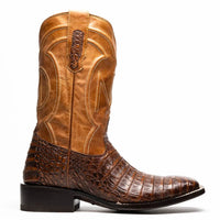 Side view of Tucson aged maple caiman belly skin cowboy boot with signature red interior lining.