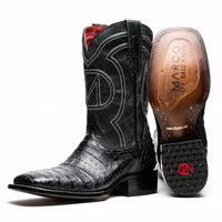 Close-up of the Tucson Black cowboy boot showing caiman belly skin texture and square toe detail.