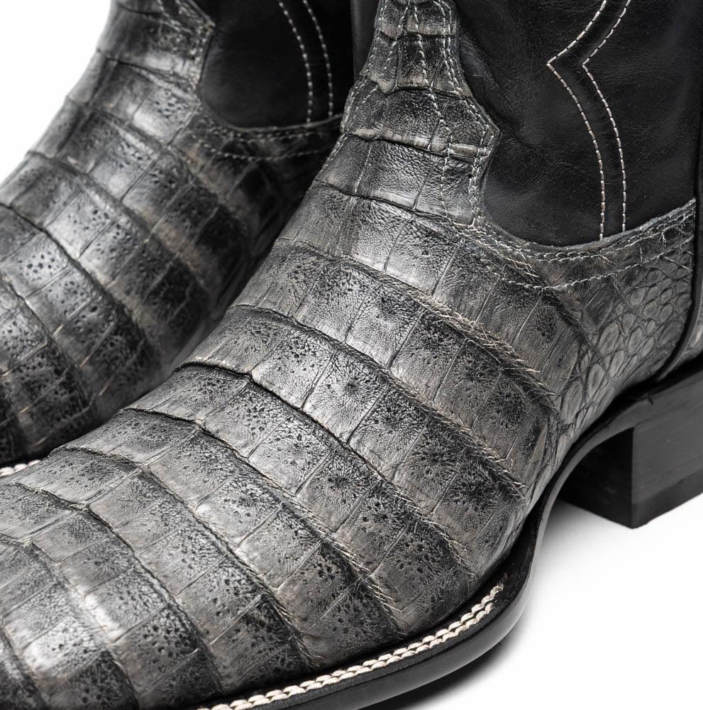 Side profile of Tucson Stone Gray boot showing polished finish and bold natural texture.