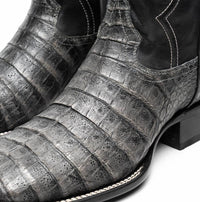 Side profile of Tucson Stone Gray boot showing polished finish and bold natural texture.