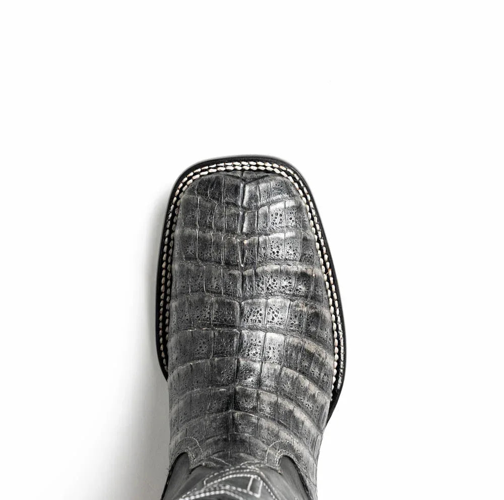 Close-up detail of boot's caiman belly skin pattern and clean leather lines on Tucson Stone Gray.