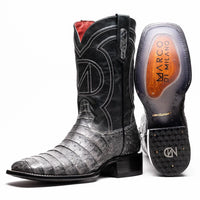 Close-up side view of Tucson Stone Gray cowboy boot showing square toe and caiman belly skin texture.