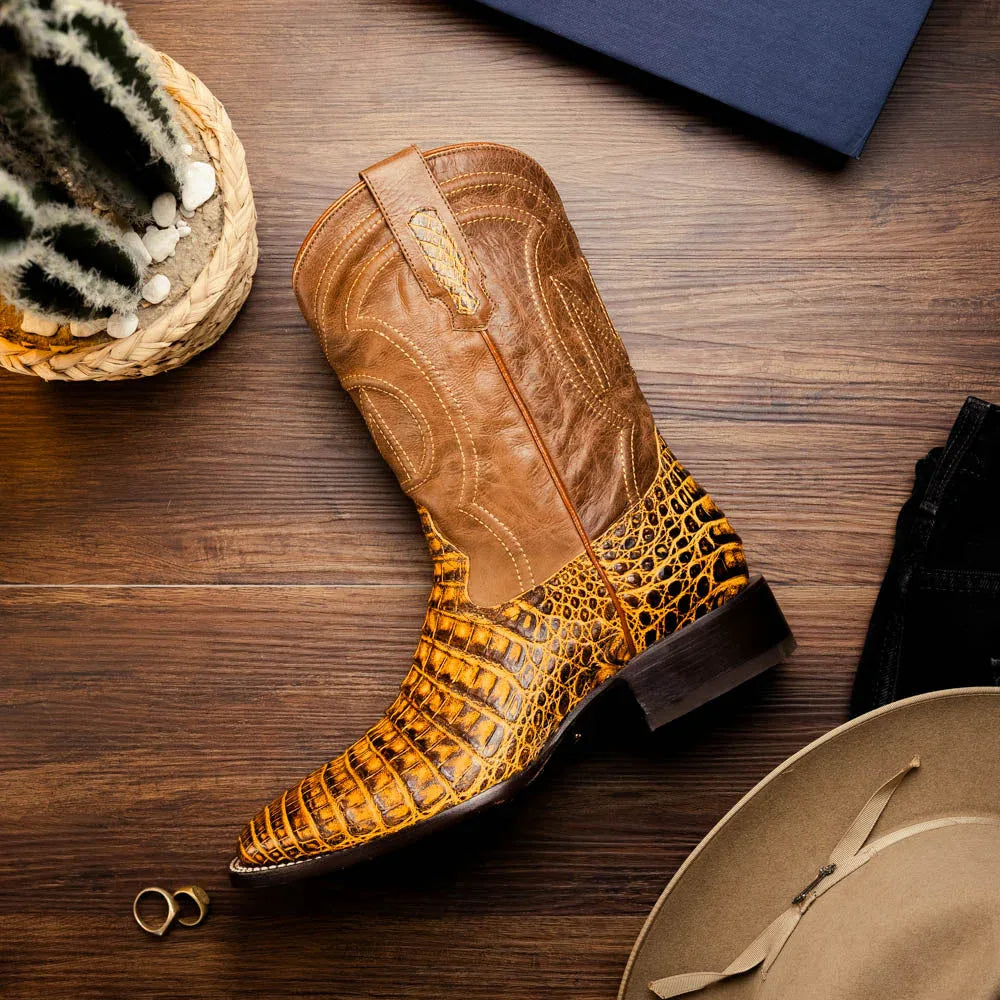 Tucson Mustard Brown boot resting on wooden surface showcasing square toe and detailed leather.