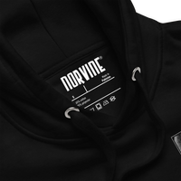 Close-up of Norvine Rebel Mask hoodie showing fabric texture and matching flat drawstrings.
