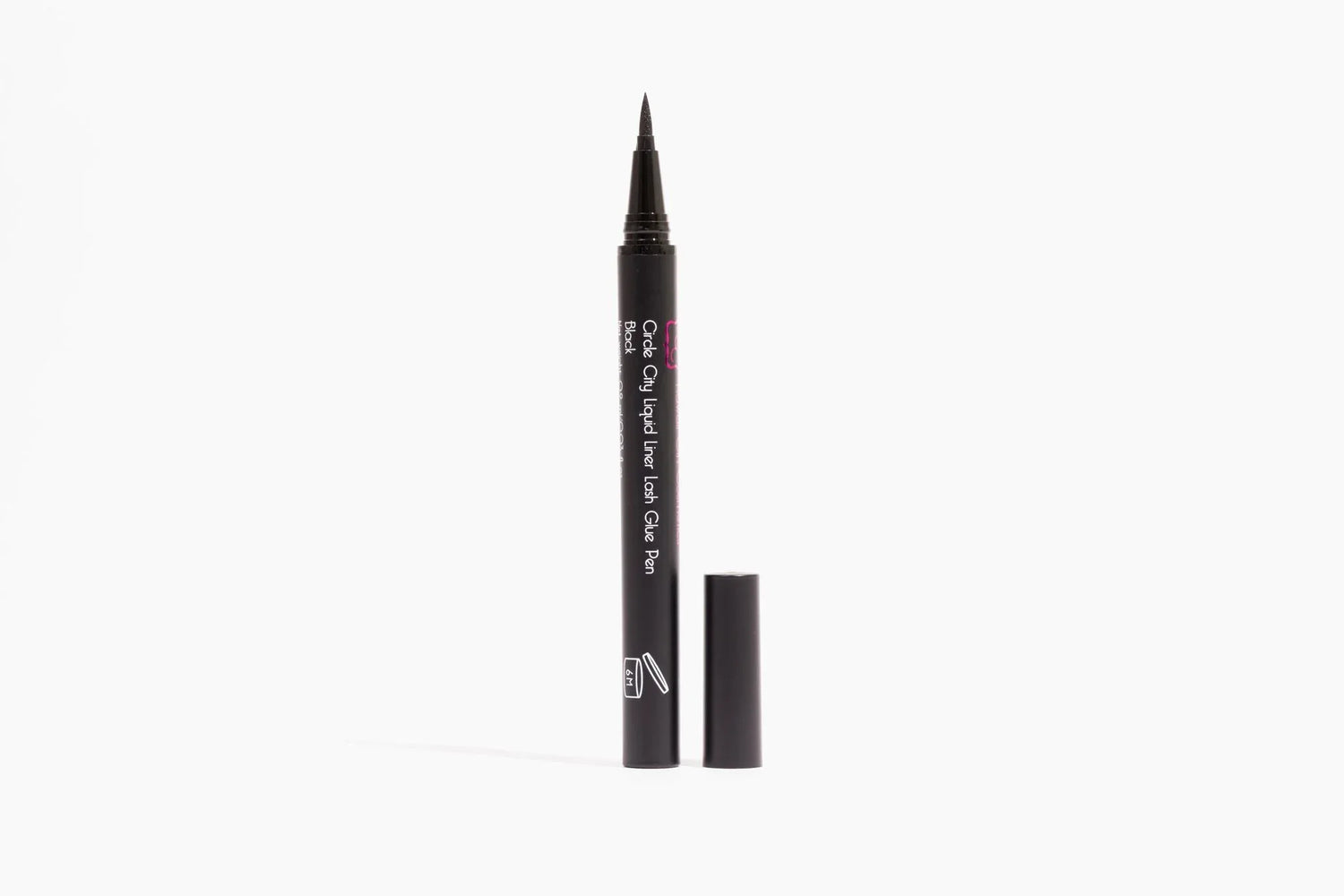 Close-up of Circle City Liquid Liner Lash Glue Pen showing smooth black liquid liner stroke on white background.