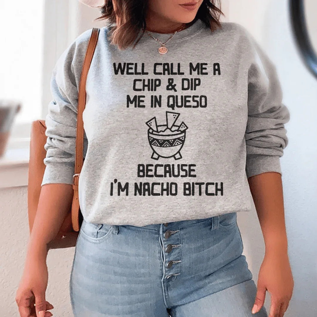 Sport grey sweatshirt with playful 'Well Call Me A Chip & Dip Me In Queso' text design on front.