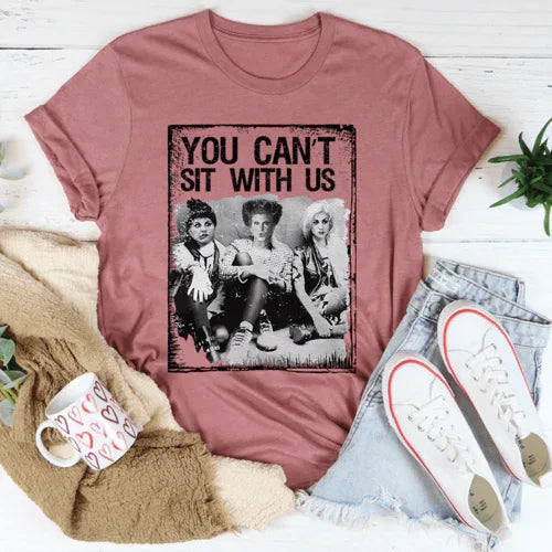 Heather mauve t-shirt displaying black text 'You Can't Sit With Us' across the chest.