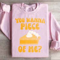 Light pink sweatshirt with white text 'You Wanna Piece Of Me' printed on front, small size.